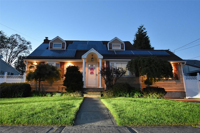 view of front of house with a chimney