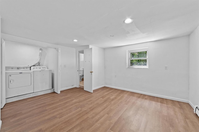 16 S Lawrence Ave, Elmsford, NY 10523 - below grade area featuring washer and dryer, baseboards, light wood finished floors, recessed lighting, and a baseboard radiator