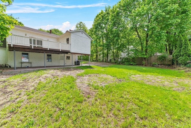 16 S Lawrence Ave, Elmsford, NY 10523 - view of green lawn featuring a deck and central AC unit