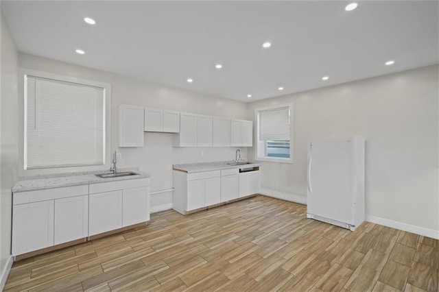 27 Catskill High Rail, Monroe, NY 10950 - kitchen with a sink, wood tiled floors, light countertops, and recessed lighting