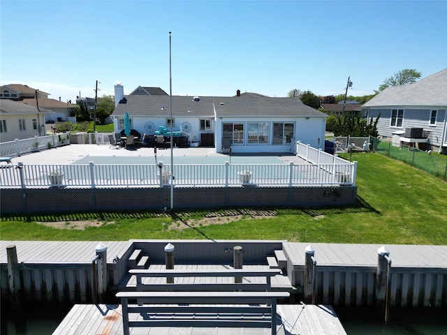 39 Whiting Rd, East Quogue, NY 11942 - rear view of property featuring a wooden deck