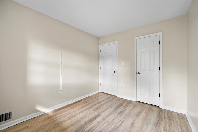 65 Jimal Dr, Middletown, NY 10940 - unfurnished bedroom featuring wood finished floors and baseboards