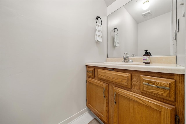 65 Jimal Dr, Middletown, NY 10940 - bathroom with vanity, tile patterned floors, and baseboards