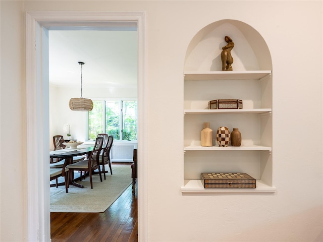 37 Longview Rd, Port Washington, NY 11050 - corridor with dark wood finished floors and built in shelves