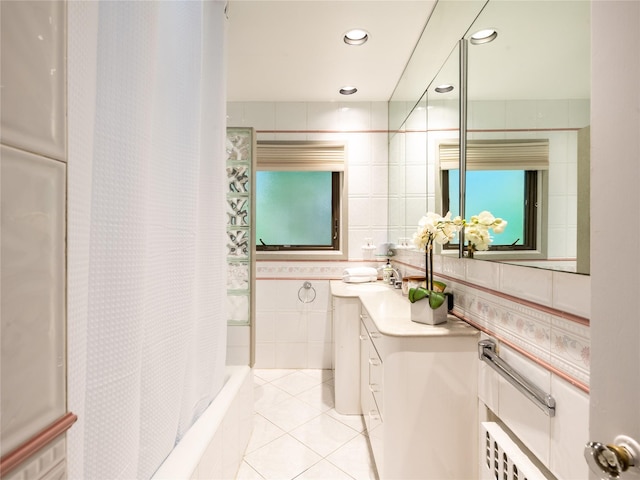 37 Longview Rd, Port Washington, NY 11050 - full bathroom with tile walls, tile patterned floors, vanity, recessed lighting, and shower / bathtub combination with curtain