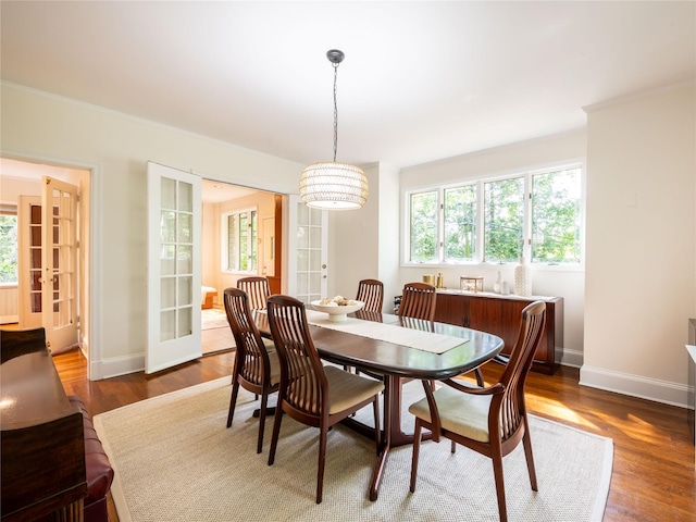 37 Longview Rd, Port Washington, NY 11050 - dining area featuring plenty of natural light, wood finished floors, baseboards, and crown molding