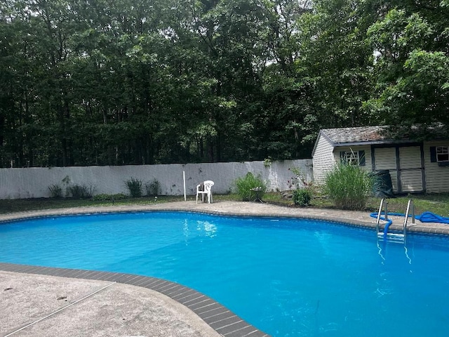 85 Mowbray St, Patchogue, NY 11772 - view of swimming pool featuring an outdoor structure