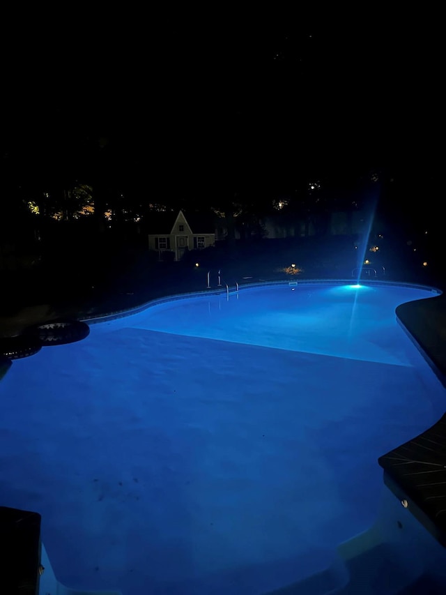 85 Mowbray St, Patchogue, NY 11772 - pool at twilight with an outdoor pool