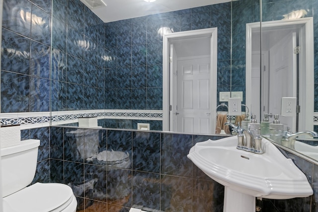 85 Mowbray St, Patchogue, NY 11772 - half bathroom with tile walls and toilet