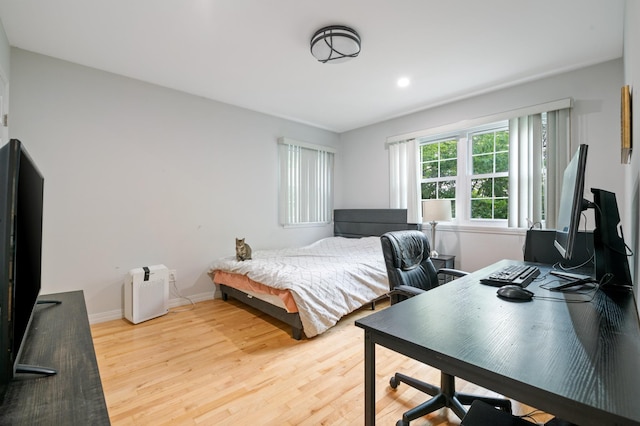85 Mowbray St, Patchogue, NY 11772 - bedroom featuring light wood finished floors and a desk