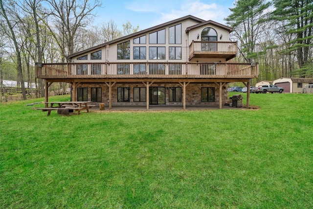 216 Cortese Rd, Call Listing Agent, PA 18405 - rear view of property featuring a deck and a lawn
