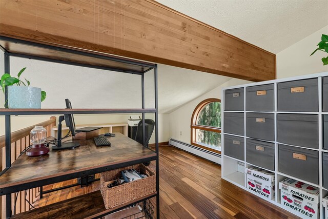 216 Cortese Rd, Call Listing Agent, PA 18405 - home office with vaulted ceiling, a baseboard radiator, wood-type flooring, and a textured ceiling
