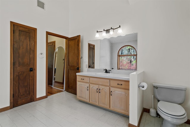 216 Cortese Rd, Call Listing Agent, PA 18405 - bathroom with baseboards, vanity, tile patterned floors, and toilet