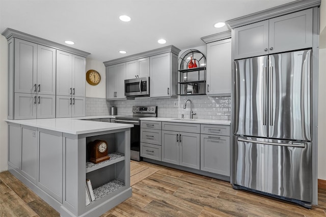 216 Cortese Rd, Call Listing Agent, PA 18405 - kitchen featuring appliances with stainless steel finishes, gray cabinetry, open shelves, a sink, and recessed lighting