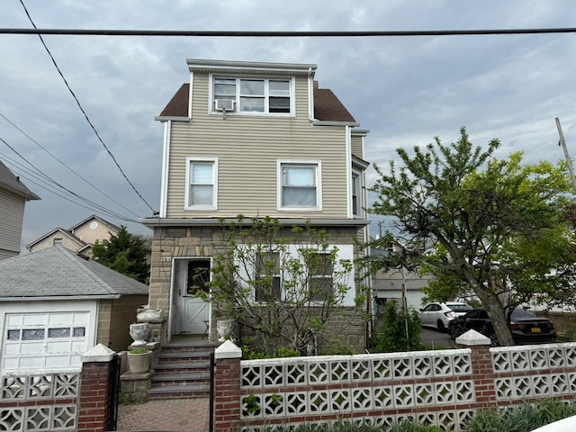 163 Villa Ave, Yonkers, NY 10704 - view of front of house featuring fence and an outdoor structure