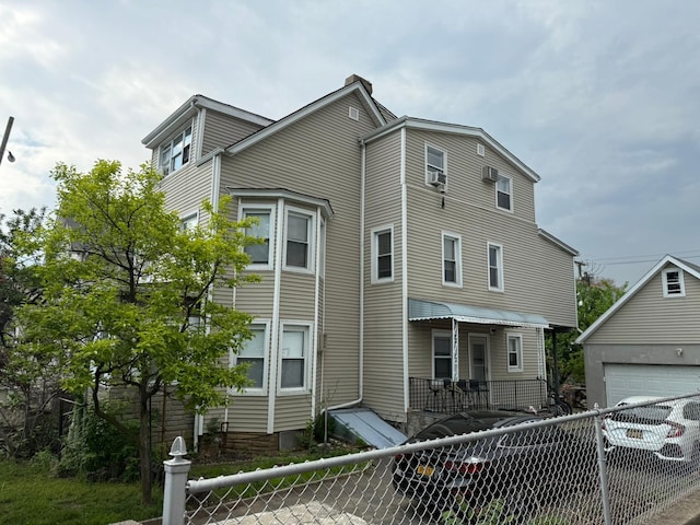 163 Villa Ave, Yonkers, NY 10704 - view of front of property with fence and cooling unit