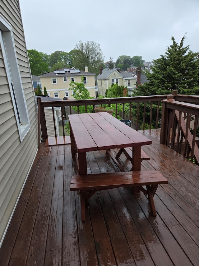 163 Villa Ave, Yonkers, NY 10704 - wooden terrace featuring outdoor dining area and a residential view