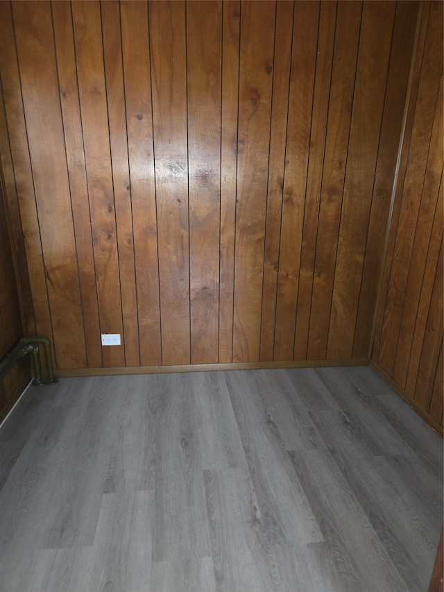 163 Villa Ave, Yonkers, NY 10704 - empty room with wood finished floors and wood walls