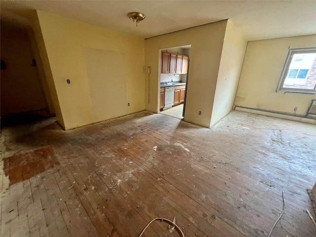 unfurnished living room featuring light wood-style flooring