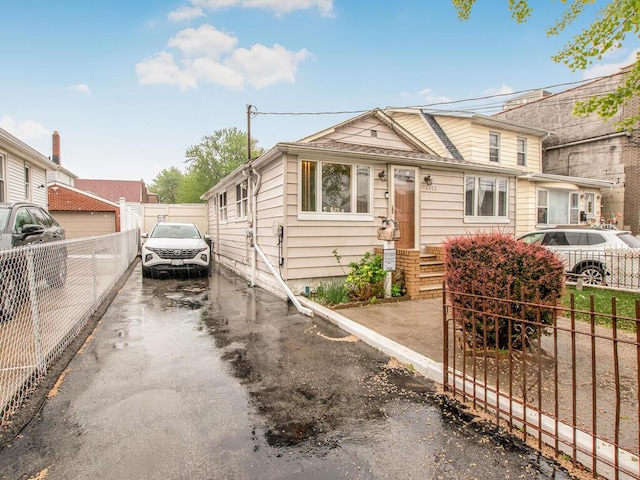 view of front of house with fence