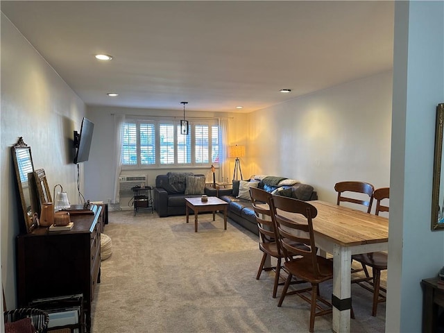 dining space featuring carpet floors and recessed lighting