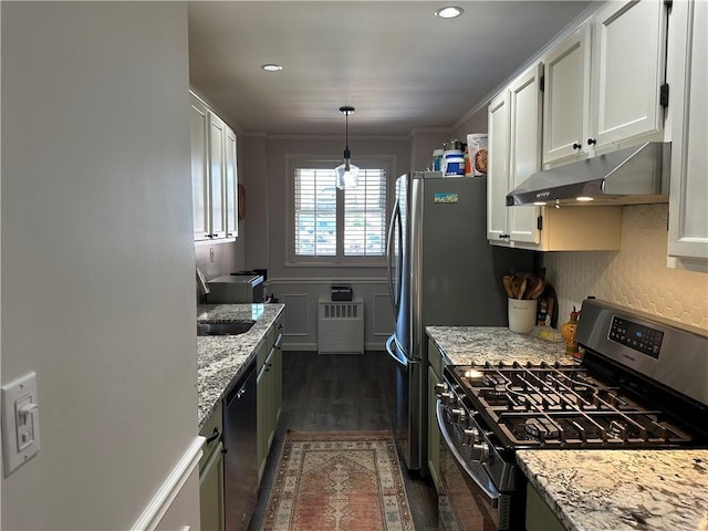 kitchen with stainless steel appliances, under cabinet range hood, white cabinets, dark wood-style flooring, and light stone counters