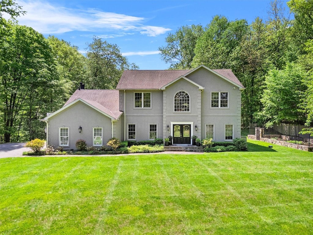 27 Pheasant Run Rd, Putnam Valley, NY 10579 - colonial inspired home with french doors and stucco siding