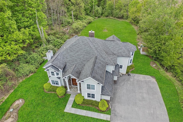 view from above of property featuring a forest
