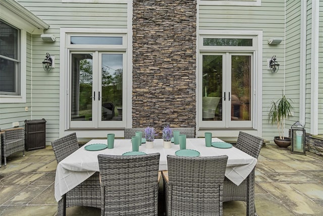 view of patio / terrace with french doors and outdoor dining space