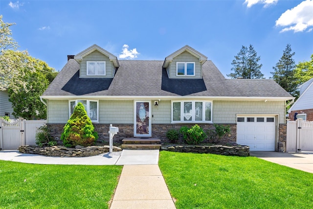 view of front of house featuring a gate, a garage, concrete driveway, and roof with shingles