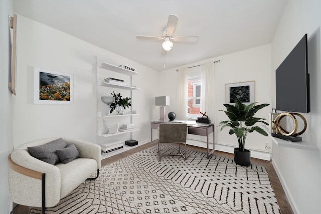 6629 74th St, Middle Village, NY 11379 - office featuring wood finished floors, a ceiling fan, and baseboards