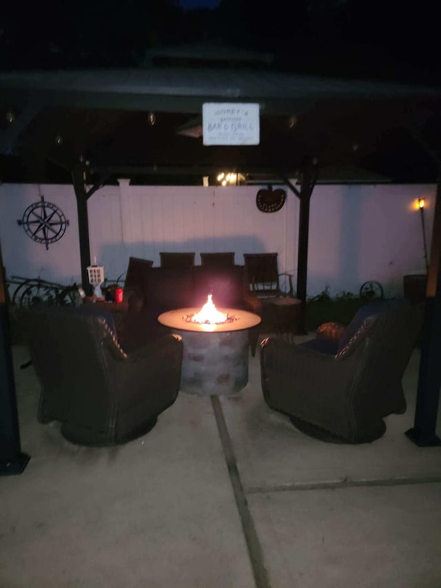 53 Bayview Ave, East Islip, NY 11730 - patio at night featuring a gazebo and a fire pit