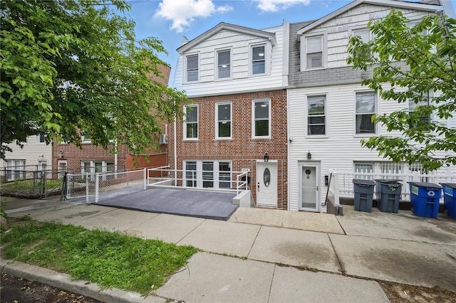 234 Quincy Ave, Bronx, NY 10465 - townhome / multi-family property with a patio and brick siding