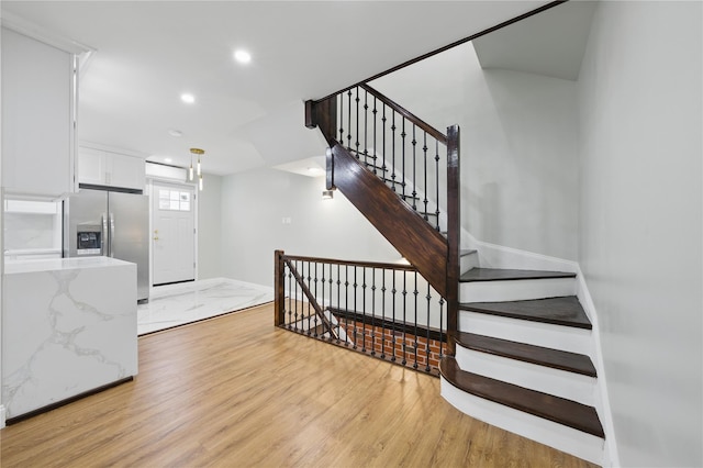 234 Quincy Ave, Bronx, NY 10465 - stairway featuring wood finished floors, baseboards, and recessed lighting
