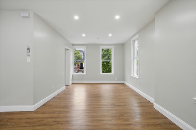 234 Quincy Ave, Bronx, NY 10465 - spare room with recessed lighting, wood finished floors, and baseboards