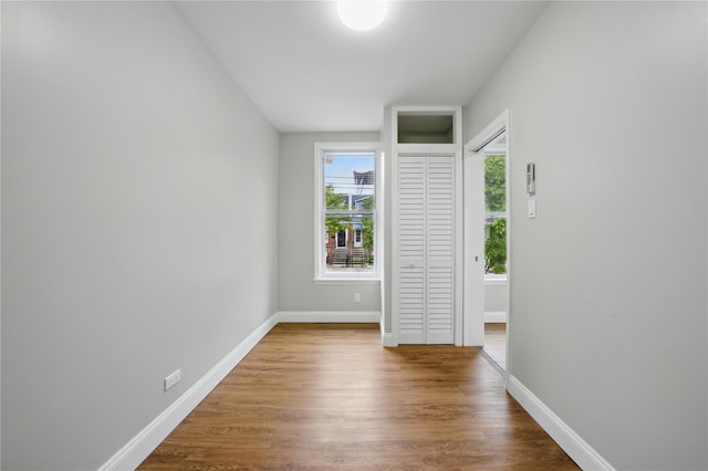 234 Quincy Ave, Bronx, NY 10465 - unfurnished room featuring wood finished floors and baseboards