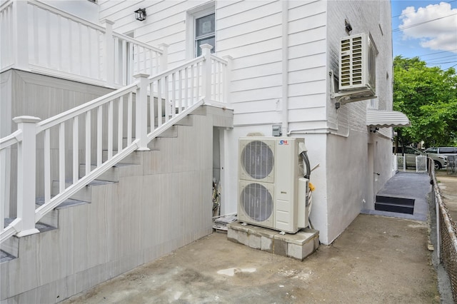 234 Quincy Ave, Bronx, NY 10465 - view of home's exterior with a cooling unit and stairway