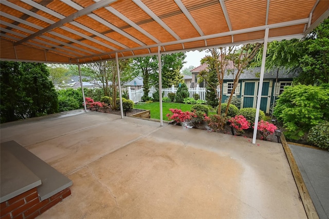 view of patio / terrace featuring fence