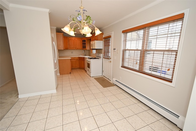 kitchen featuring white appliances, a baseboard heating unit, a chandelier, ornamental molding, and a sink