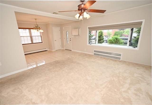 unfurnished living room featuring baseboard heating, healthy amount of natural light, a chandelier, crown molding, and carpet