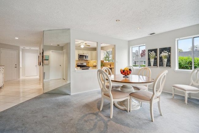 106 E Midland Pond Ct First Floor, First Floor, Moriches, NY 11955 - dining area featuring a textured ceiling, light colored carpet, baseboards, light tile patterned floors, and recessed lighting