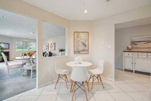 106 E Midland Pond Ct First Floor, First Floor, Moriches, NY 11955 - dining room with light tile patterned floors, baseboards, light carpet, and recessed lighting