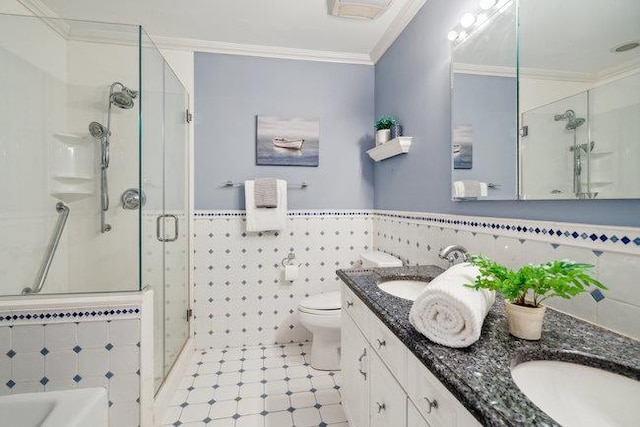 106 E Midland Pond Ct First Floor, First Floor, Moriches, NY 11955 - bathroom featuring ornamental molding, tile walls, a shower stall, double vanity, and toilet