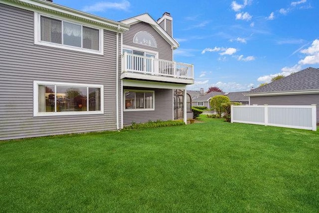 106 E Midland Pond Ct First Floor, First Floor, Moriches, NY 11955 - back of property featuring a chimney and a balcony