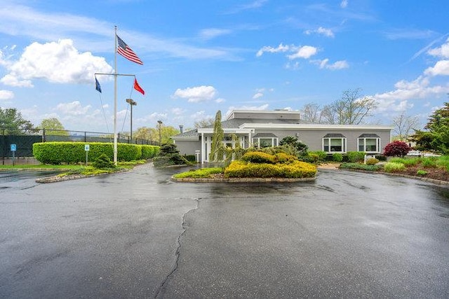 106 E Midland Pond Ct First Floor, First Floor, Moriches, NY 11955 - view of building exterior with fence