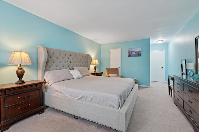 711 Shore Rd Unit 4F, Long Beach, NY 11561 - bedroom with light colored carpet and baseboards