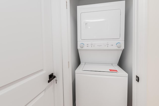 147 Florence St, Yonkers, NY 10704 - washroom with stacked washer / dryer