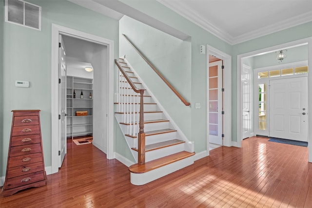 1 Sly St, Warwick, NY 10990 - foyer with hardwood / wood-style flooring, stairs, baseboards, and ornamental molding