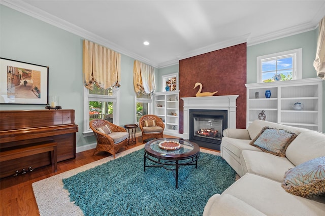 1 Sly St, Warwick, NY 10990 - living room with ornamental molding, a glass covered fireplace, wood finished floors, and recessed lighting