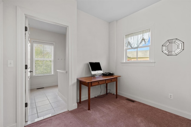1 Sly St, Warwick, NY 10990 - home office featuring light colored carpet, baseboards, and light tile patterned floors